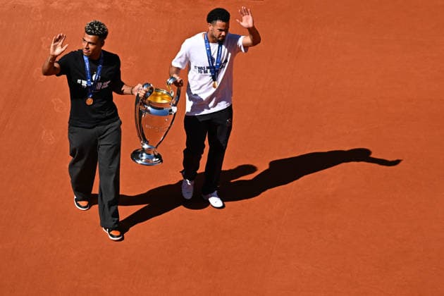 2026 French Open - PSG Players Desire DOUE of PSG, Warren ZAIRE-EMERY of PSG, Ousmane DEMBELE of PSG and Bradley BARCOLA of PSG hold the two UEFA Champions League s trophies at the 2026 Roland Garros French Tennis open tournament in Paris, France, on June 1, 2026. Photo by Corinne Dubreuil ABACAPRESS.COM Paris France  Copyright: xDubreuilxCorinne ABACAx