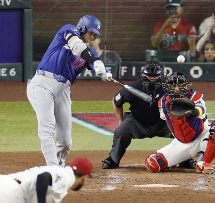 Baseball: Dodgers vs. Diamondbacks Los Angeles Dodgers designated hitter Shohei Ohtani hits a double in the third inning of a baseball game against the Arizona Diamondbacks at Chase Field in Phoenix, Arizona, on June 1, 2026.  A14AA0005617412P