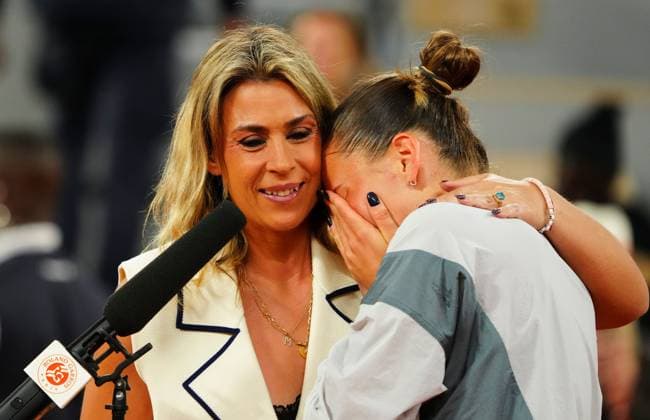 A tearful Marta Kostyuk is consoled by Marion Bartoli in her post match on court interviews French Open Tennis, Day Ten, Tennis, Roland Garros, Paris, France - 02 Jun 2026Paris Roland Garros France EDITORIAL USE ONLY No use with unauthorised audio, video, data, fixture lists, club league logos or live services. Online in-match use limited to 120 images, no video emulation. No use in betting, games or single club league player publications.  Copyright: xJavierxGarcia Shutterstockx 16906549g