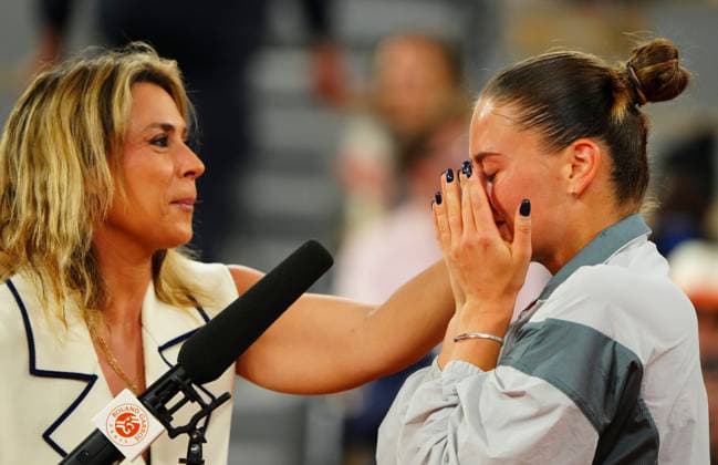 A tearful Marta Kostyuk is consoled by Marion Bartoli in her post match on court interviews French Open Tennis, Day Ten, Tennis, Roland Garros, Paris, France - 02 Jun 2026Paris Roland Garros France EDITORIAL USE ONLY No use with unauthorised audio, video, data, fixture lists, club league logos or live services. Online in-match use limited to 120 images, no video emulation. No use in betting, games or single club league player publications.  Copyright: xJavierxGarcia Shutterstockx 16906549i