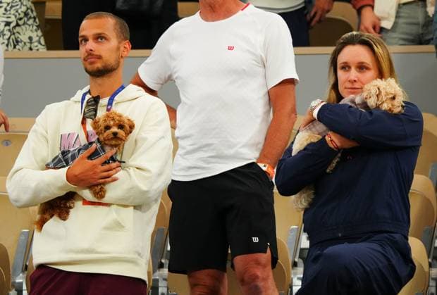 The dogs of Marta Kostyuk make an appearance during her on court interview after her win over Elina Svitolina French Open Tennis, Day Ten, Tennis, Roland Garros, Paris, France - 02 Jun 2026Paris Roland Garros France EDITORIAL USE ONLY No use with unauthorised audio, video, data, fixture lists, club league logos or live services. Online in-match use limited to 120 images, no video emulation. No use in betting, games or single club league player publications.  Copyright: xJavierxGarcia Shutterstockx 16906549o