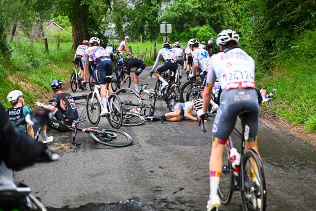 Tour de Wallonie 2026 Stage 2 LIBRAMONT-CHEVIGNY, BELGIUM - JUNE 02 : crash in the peloton during stage 2 of the 47th edition of Ethias Tour de Wallonie an UCI ProSeries 2.Pro cycling road race stage for Men Elite of 192.1 km with start in Jodoigne and finish in Libramont-Chevigny on June 2, 2026 in Libramont-Chevigny, Belgium, 02 06 2026 ( Motordriver Pieter Van Herzele - Libramont-Chevigny Belgium  Copyright: xVincentxKalutx