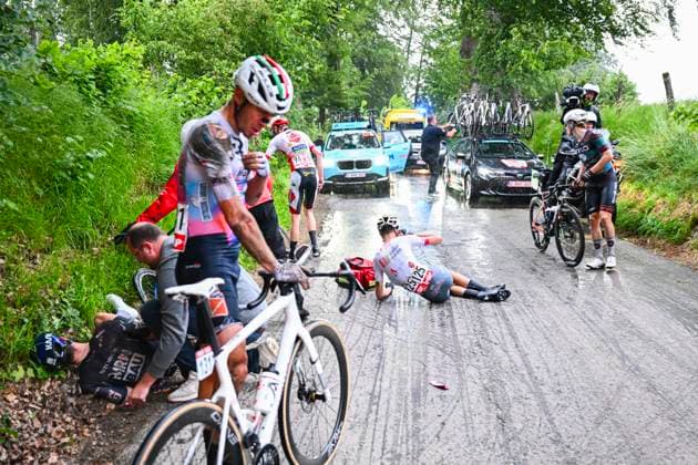 Tour de Wallonie 2026 Stage 2 LIBRAMONT-CHEVIGNY, BELGIUM - JUNE 02 : Marx Louis (BEL) of Color Code - Alu Center in a crash during stage 2 of the 47th edition of Ethias Tour de Wallonie an UCI ProSeries 2.Pro cycling road race stage for Men Elite of 192.1 km with start in Jodoigne and finish in Libramont-Chevigny on June 2, 2026 in Libramont-Chevigny, Belgium, 02 06 2026 ( Motordriver Pieter Van Herzele - Libramont-Chevigny Belgium  Copyright: xVincentxKalutx