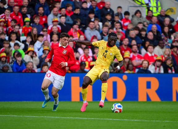 RECORD DATE NOT STATED 2nd June 2026; Cardiff City Stadium, Cardiff, Wales; Friendly International Football, Wales versus Ghana; Joshua Sheehan of Wales adds pressure to Gideon Mensah of Ghana AledxHopkins