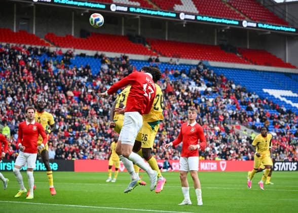 RECORD DATE NOT STATED 2nd June 2026; Cardiff City Stadium, Cardiff, Wales; Friendly International Football, Wales versus Ghana; Kieffer Moore of Wales and Marvin Senaya of Ghana climb high to head the ball AledxHopkins