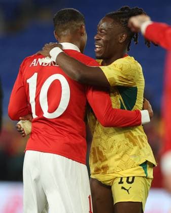 Brandon Thomas-Asante of Ghana hugs Kai Andrews of Wales at full time Wales v Ghana, International Friendly, Länderspiel, Nationalmannschaft Football, Cardiff City Stadium, Cardiff, Wales, UK - 02 Jun 2026Cardiff Cardiff City Stadium United Kingdom EDITORIAL USE ONLY No use with unauthorised audio, video, data, fixture lists, club league logos or live services. Online in-match use limited to 120 images, no video emulation. No use in betting, games or single club league player publications.  Copyright: xKieranxMcManus Shutterstockx 16906575bi