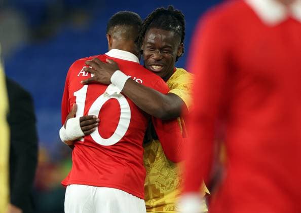 Brandon Thomas-Asante of Ghana hugs Kai Andrews of Wales at full time Wales v Ghana, International Friendly, Länderspiel, Nationalmannschaft Football, Cardiff City Stadium, Cardiff, Wales, UK - 02 Jun 2026Cardiff Cardiff City Stadium United Kingdom EDITORIAL USE ONLY No use with unauthorised audio, video, data, fixture lists, club league logos or live services. Online in-match use limited to 120 images, no video emulation. No use in betting, games or single club league player publications.  Copyright: xKieranxMcManus Shutterstockx 16906575bj