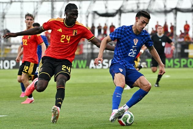 Croatia, Rijeka, 020626. Rujevica Stadium. Friendly football match on the eve of the World Cup, Croatia - Belgium. In the photo: Amadou Onana, Petar Musa. Photo: Damir Krajac CROPIX Zagreb Croatia Copyright: xxDamirxKrajacx hrvatska_belgija67-020626