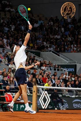 (260603) -- PARIS, June 3, 2026 -- Jakub Mensik hits a return during the men s singles quarterfinal match between Jakub Mensik of the Czech Republic and Joao Fonseca of Brazil at the French Open tennis tournament at Roland Garros, Paris, France, June 2, 2026. (Photo by Xinhua) (SP)FRANCE-PARIS-TENNIS-FRENCH OPEN-MEN S SINGLES-QUARTERFINAL GlennxGervot 