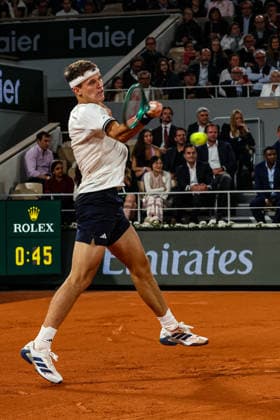 (260603) -- PARIS, June 3, 2026 -- Jakub Mensik hits a return during the men s singles quarterfinal match between Jakub Mensik of the Czech Republic and Joao Fonseca of Brazil at the French Open tennis tournament at Roland Garros, Paris, France, June 2, 2026. (Photo by Xinhua) (SP)FRANCE-PARIS-TENNIS-FRENCH OPEN-MEN S SINGLES-QUARTERFINAL GlennxGervot 