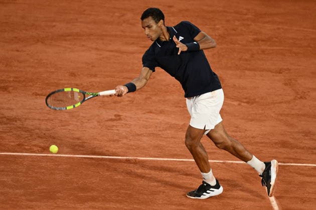 2026 French Open (Roland-Garros) - Day 11 PARIS, FRANCE - JUNE 3: Felix Auger-Aliassime of Canada in action against Flavio Cobolli (not seen) of Italy during Men s Singles quarter-final match on the eleventh day of the French Open at Philippe-Chatrier Court in Paris, France, on June 3, 2026. Burak Akbulut Anadolu Paris France. Editorial use only. Please get in touch for any other usage.  Copyright: x2026xAnadoluxBurakxAkbulutx