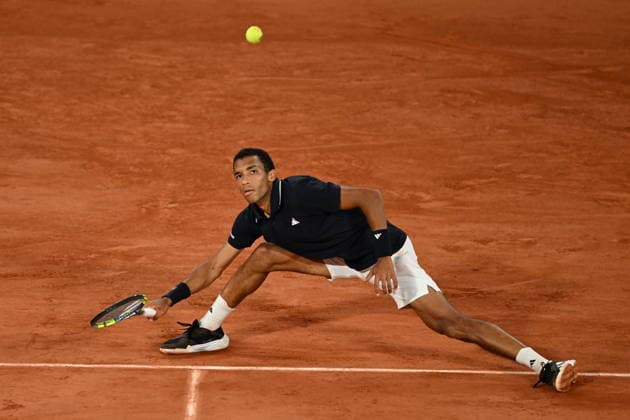 2026 French Open (Roland-Garros) - Day 11 PARIS, FRANCE - JUNE 3: Felix Auger-Aliassime of Canada in action against Flavio Cobolli (not seen) of Italy during Men s Singles quarter-final match on the eleventh day of the French Open at Philippe-Chatrier Court in Paris, France, on June 3, 2026. Burak Akbulut Anadolu Paris France. Editorial use only. Please get in touch for any other usage.  Copyright: x2026xAnadoluxBurakxAkbulutx