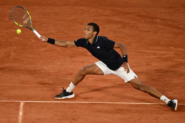 2026 French Open (Roland-Garros) - Day 11 PARIS, FRANCE - JUNE 3: Felix Auger-Aliassime of Canada in action against Flavio Cobolli (not seen) of Italy during Men s Singles quarter-final match on the eleventh day of the French Open at Philippe-Chatrier Court in Paris, France, on June 3, 2026. Burak Akbulut Anadolu Paris France. Editorial use only. Please get in touch for any other usage.  Copyright: x2026xAnadoluxBurakxAkbulutx
