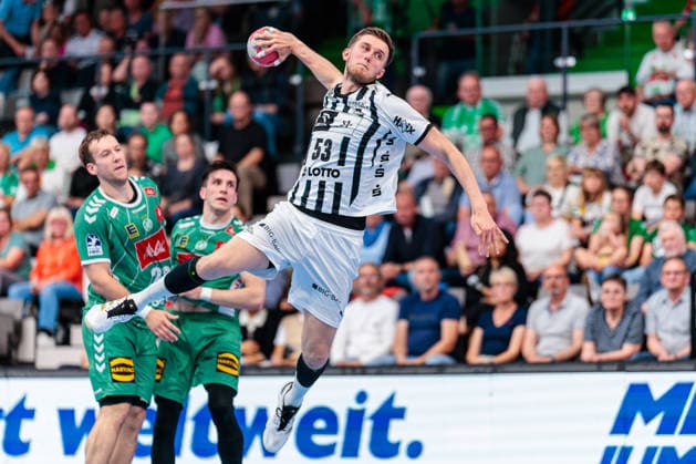 L R Niclas Benedict Heitkamp GWD Minden, 23 , Jakub Sterba GWD Minden, 19 , Nikola Bilyk THW Kiel, 53 on goal GER, GWD Minden vs THW Kiel, Handball, 1 Bundesliga, Matchday 33, Season 2025 2026, 03 06 2026 GER, GWD Minden vs THW Kiel, Handball, 1 Bundesliga, Matchday 33, Season 2025 2026, 03 06 2026 Minden Copyright: xEibner-Pressefoto JanxRollingerx EP_JSK