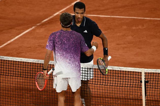 2026 French Open (Roland-Garros) - Day 11 PARIS, FRANCE - JUNE 3: Flavio Cobolli (L) of Italy hugs Felix Auger-Aliassime (R) after winning the Men s Singles quarter-final match on the eleventh day of the French Open at Philippe-Chatrier Court in Paris, France, on June 3, 2026. Burak Akbulut Anadolu Paris France. Editorial use only. Please get in touch for any other usage.  Copyright: x2026xAnadoluxBurakxAkbulutx