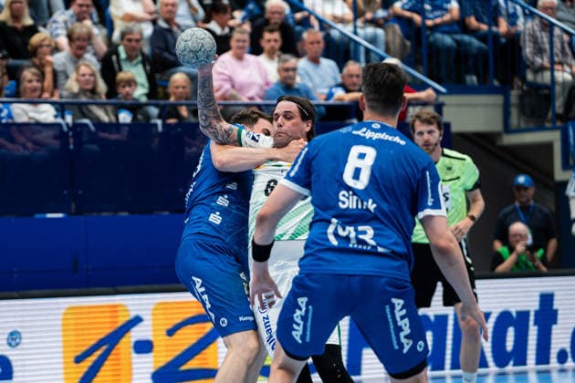 TBV Lemgo Lippe GER vs SC DHfK Leipzig GER , Handball, Daikin Handball Bundesliga, 33 Matchday, 3 6 2026, Season 2025 2026, Lemgo Hendrik Wagner TBV Lemgo Lippe, 28 defends against Dean Bombac SC DHfK Leipzig, 67 Lemgo Phoenix Contact Arena Germany