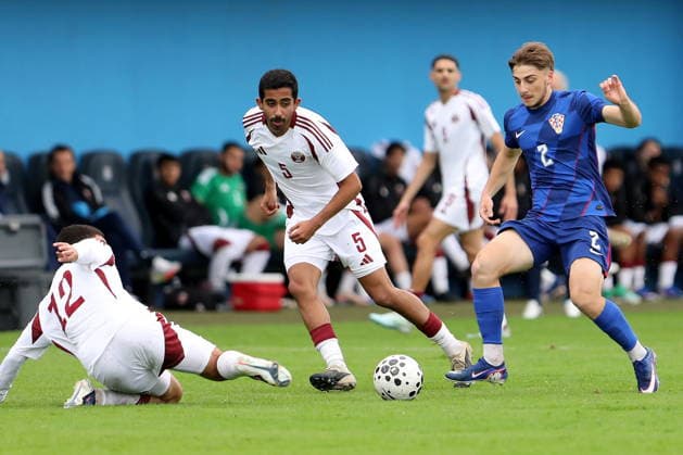 Fußball, U21, Testspiel, Kroatien - Katar Croatia, Zagreb, 030626. Rudes Stadium. Friendly match of the U21, U 21 national teams: Croatia - Qatar. In the photo: Ali Mohammad Shahabi, Filip Kruselj. Photo: Ranko Suvar CROPIX Zagreb Croatia Copyright: xxRankoxSuvarx hrvatska_katar17-030626