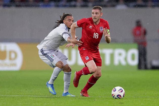 Laurent Jans captain Luxembourg 18 in duel with Luca Koleosho Italy 11 Football, Season 2025 2026, Friendly match, International match 03 06 2026 National team Luxembourg Italy LUX vs ITA Stade de Luxembourg, Luxembourg