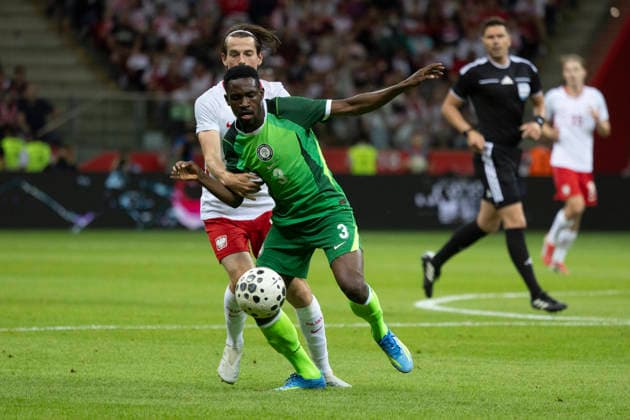 Fußball, Testspiel, Polen - Nigeria #4 Poland - Nigeria 03.06.2026 football, Warsaw, PGE National Stadium, FIFA , friendly international game match Poland - Nigeria ( mecz towarzyski, pilka nozna, Polska - Nigeria ) image shows: Jakub Kaminski (back) Zaidu Sanusi (front) photo Katarzyna Plewczynska Fotostyk Copyright: xKatarzynaxPlewczynskax 20260603FCTKPKAPL7692