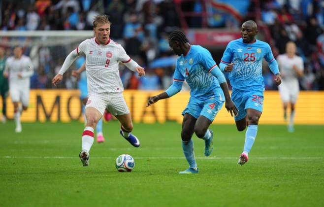 Rasmus Hoejlund Denmark and Axel Tuanzebe DR Congo battle for the ball during DR Congo and Denmark, UEFA International Friendly, Stade Maurice Dufrasne, Liege, Belgium on June 3, 2026 Thor Wegner DeFodi Images Photo by DeFodi Images