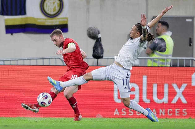 Laurent Jans captain Luxembourg 18 in duel with Luca Koleosho Italy 11 Football, Season 2025 2026, Friendly match, International match 03 06 2026 National team Luxembourg Italy LUX vs ITA Stade de Luxembourg, Luxembourg