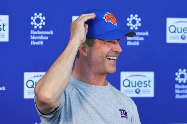 EAST RUTHERFORD, NJ- JUNE 03: John Harbaugh head coach of the New York Giants speaks at the podium wearing a New York Knicks hat after OTA Practice on June 3, 2026 at Quest Diagnostic Center in East Rutherford, New Jersey. (Photo by Rich Graessle Icon Sportswire) NFL, American Football Herren, USA JUN 03 New York Giants OTA EDITORIAL USE ONLY Icon26060326496