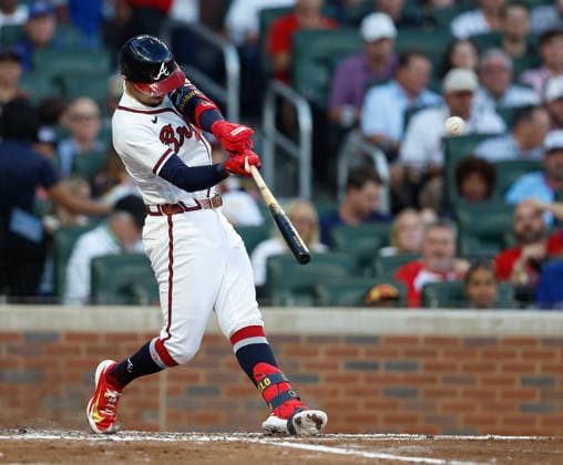 Left fielder Mauricio Dubon 14 of the Atlanta Braves hits a 3-run home run in the third inning against the Toronto Blue Jays at Truist Park on Wednesday, June 3, 2026 in Atlanta, Georgia.  ATL20260603109 MikexZarrilli