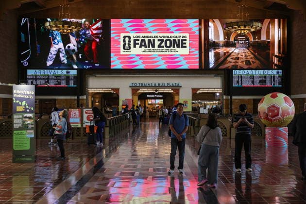 Los Angeles showcases World Cup features ahead of matches Transit riders take photos in front of the FIFA World Cup, WM, Weltmeisterschaft, Fussball signage at Union Station in Los Angeles, California, USA, 03 June 2026. Transit hubs across the city are showcasing tournament graphics ahead of the FIFA World Cup, which will bring international matches and visitors to the region. LOS ANGELES CALIFORNIA UNITED STATES  Copyright: xCHRISxTORRESx