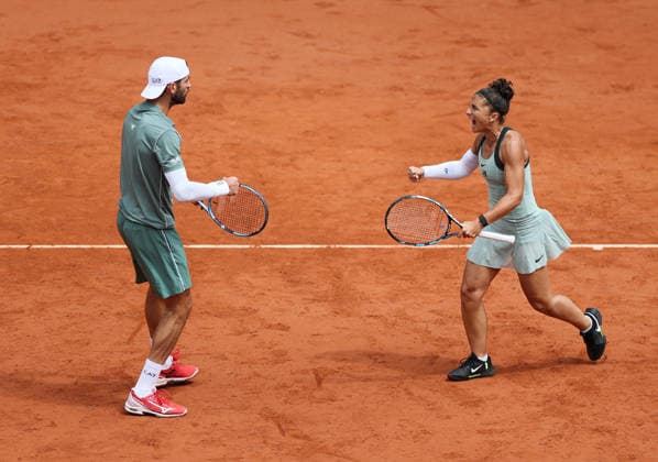 (260604) -- PARIS, June 4, 2026 -- Sara Errani (R) Andrea Vavassori celebrate scoring during the mixed doubles final match between Sara Errani Andrea Vavassori of Italy and Gabriela Dabrowski (Canada) Evan King (the United States) at the French Open tennis tournament at Roland Garros, Paris, France, June 4, 2026. ) (SP)FRANCE-PARIS-TENNIS-FRENCH OPEN-MIXED DOUBLES-FINAL WuxHuiwo 