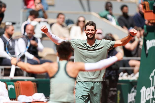 (260604) -- PARIS, June 4, 2026 -- Sara Erranix Andrea Vavassori (R) celebrate after winning the mixed doubles final match between Sara Errani Andrea Vavassori of Italy and Gabriela Dabrowski (Canada) Evan King (the United States) at the French Open tennis tournament at Roland Garros, Paris, France, June 4, 2026. ) (SP)FRANCE-PARIS-TENNIS-FRENCH OPEN-MIXED DOUBLES-FINAL WuxHuiwo 