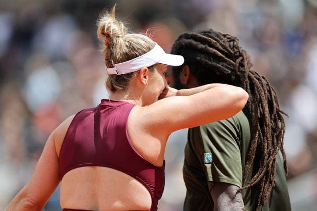 (260604) -- PARIS, June 4, 2026 -- Gabriela Dabrowski (L) Evan King communicate during the mixed doubles final match between Sara Errani Andrea Vavassori of Italy and Gabriela Dabrowski (Canada) Evan King (the United States) at the French Open tennis tournament at Roland Garros, Paris, France, June 4, 2026. ) (SP)FRANCE-PARIS-TENNIS-FRENCH OPEN-MIXED DOUBLES-FINAL WuxHuiwo 