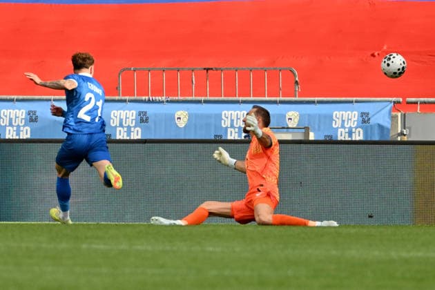 LJUBLJANA, SLOVENIA - JUNE 04: Marinos Tzionis of Cyprus (L) in action and score against Jan Oblak of Slovenia (R) during the International men’s football Friendly match between Slovenia and Cyprus at Stadium Stozice, Ljubljana on June 04, 2026 in Ljubljana, Slovenia. (Photo by Igor Kupljenik Sports Press Photo).  Copyright: xIgorxKupljenikx xSPPx Sportspressphoto_SPR160691