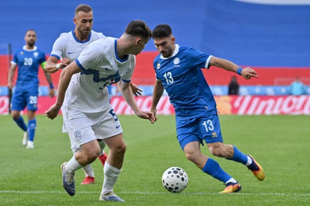 LJUBLJANA, SLOVENIA - JUNE 04: Ioannis Costi of Cyprus (R) in action against Srdjan Kuzmic of Slovenia (L) during the International men’s football Friendly match between Slovenia and Cyprus at Stadium Stozice, Ljubljana on June 04, 2026 in Ljubljana, Slovenia. (Photo by Igor Kupljenik Sports Press Photo).  Copyright: xIgorxKupljenikx xSPPx Sportspressphoto_SPR160744