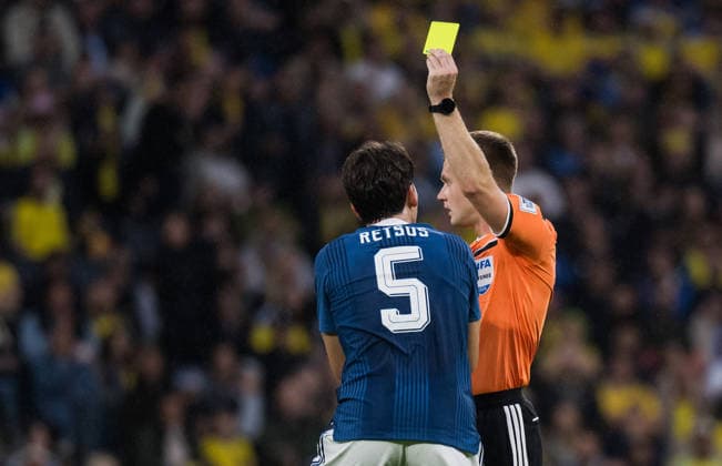 260604 Panagiotis Retsos of Greece receives a yellow card from referee Aaron Wyn Jones during the international friendly football match between Sweden and Greece on June 4, 2026 in Stockholm Photo Joel Marklund BILDBYRAN kod JM JM0822 bbeng fotboll football soccer fotball träningslandskamp international friendly sverige sweden sverige a grekland greece  Copyright: JOELxMARKLUND BB260604JM035