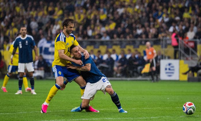 260604 Benjamin Nygren of Sweden and Kostas Tsimikas of Greece during the international friendly football match between Sweden and Greece on June 4, 2026 in Stockholm Photo Johanna Säll BILDBYRAN kod JL JM0822 bbeng fotboll football soccer fotball träningslandskamp international friendly sverige sweden sverige a grekland greece  Copyright: JOHANNAxSÄLL BB260604BB559