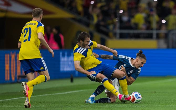 260604 Benjamin Nygren of Sweden and Kostas Tsimikas of Greece during the international friendly football match between Sweden and Greece on June 4, 2026 in Stockholm Photo Johanna Säll BILDBYRAN kod JL JM0822 bbeng fotboll football soccer fotball träningslandskamp international friendly sverige sweden sverige a grekland greece  Copyright: JOHANNAxSÄLL BB260604BB564
