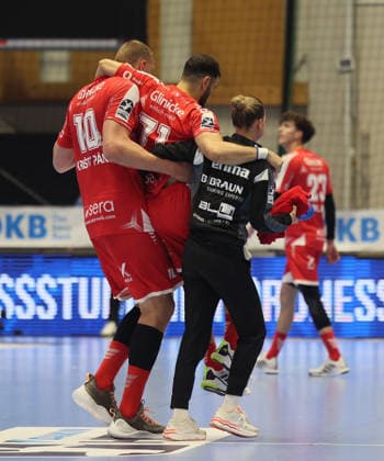 GER HBL Season 2025 2026 MT Melsungen vs FÜCHSE Berlin, 04 06 26, ROTHENBACH HALLE, Kassel Mohamed Amine DARMOUL MT Melsungen 71 is taken off the court by Dainis KRISTOPANS MT Melsungen 10 and the physiotherapist, injury