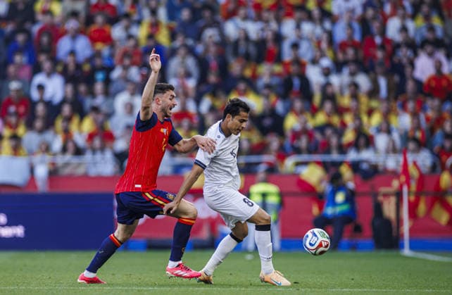 Spain v Iraq - Friendlies A CORUNA, SPAIN - JUNE 4: Aymeric Laporte of Spain (L) battles for the ball with Ibrahim Bayesh (R) of Iraq during the friendly match between the Spain and Iraq at the Riazor Stadium in A Coruna, Spain, on June 4, 2026. Pablo Garcia Sacristan Anadolu A Coruna Spain. Editorial use only. Please get in touch for any other usage.  Copyright: x2026xAnadoluxPabloxGarciaxSacristanx