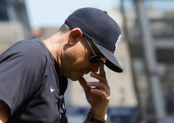 New York Yankees Aaron Boone jogs back to the dugout after talking with 3rd base umpire Laz Díaz in the fifth inning against the Cleveland Guardians at Yankee Stadium on Thursday, June 4, 2026 in New York City. The Yankees defeated the Guardians 2-1.  NYP20260604102 JOHNxANGELILLO