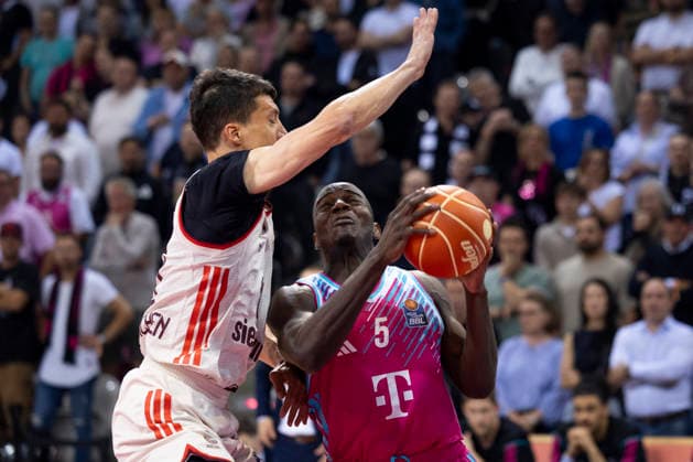 Tylan BIRTS BON 5, right on the ball in a duel against Vladimir LUCIC FCB 11, left , action final score 57 77, Basketball 1 Bundesliga Telekom Baskets Bonn FC Bayern Muenchen Basketball Munich BON vs FCB Playoffs, Semifinal, 3 Game, in T E L E C O M D O M E, on 27 05 2026, Â