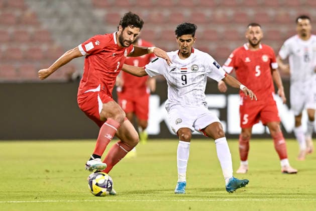 Lebanon v Yemen - AFC Asian Cup 2027 Qualifiers Khalil Khamis (L) of Lebanon and Omar Al-Dahi of Yemen compete during the Asian Cup Saudi Arabia 2027 Qualifiers match between Lebanon and Yemen at Grand Hamad Stadium Stadium in Doha, Qatar, on June 4, 2026. DOHA Qatar Copyright: xNOUSHADx