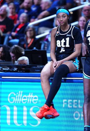 INDIANAPOLIS, IN - JUNE 04: Atlanta Dream center Angel Reese (5) sits on the scorerâ„¢s table as she waits to check into the game against the Indiana Fever on June 4, 2026, at Gainbridge Fieldhouse in Indianapolis, Indiana. (Photo by Brian Spurlock Icon Sportswire) WNBA, Basketball Damen, USA JUN 04 Atlanta Dream at Indiana Fever EDITORIAL USE ONLY Icon26060436