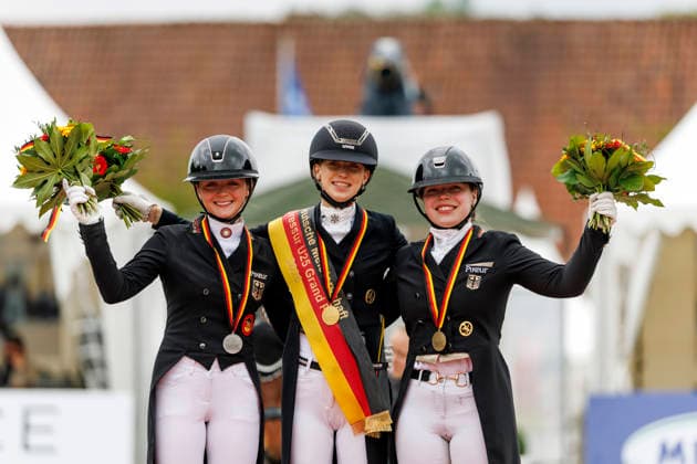BALVE LONGINES Balve Optimum 2026, BALVE LONGINES Balve Optimum 2026 BAUMGUERTEL Lucie Anouk GER , OATLEY Rose GER , GAGEL Pia Carlotta GER Championship ceremony PIAFF FOÌˆRDERPREIS Preis der Liselott Schindling Stiftung German Championships Dressage U25 U25 Grand Prix Balve, riding facility Schloss Wocklum 05 June 2026