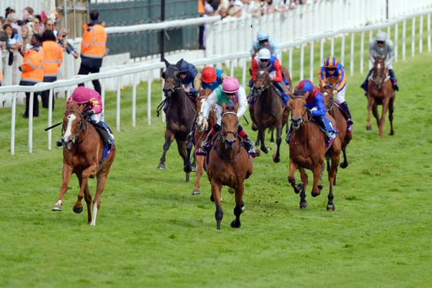 05 06 2026, Epsom, Surrey, GBR Thundering On left with Dylan Browne McMonagle up wins the Epsom Oaks Epsom Downs racecourse horse, jockey, Thundering On, McMonagle, win, finish, finish 260605C986EPSOM JPG