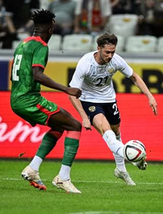 Russia Soccer Friendly Russia - Burkina Faso 9183376 05.06.2026 Burkina Faso s Edmond Tapsoba and Russia s Anton Miranchuk struggle for a ball during the friendly soccer match between Russia and Burkina Faso at Volgograd Arena stadium, in Volgograd, Russia. Maksim Blinov Sputnik Volgograd Russia  Copyright: xMaksimxBlinovx