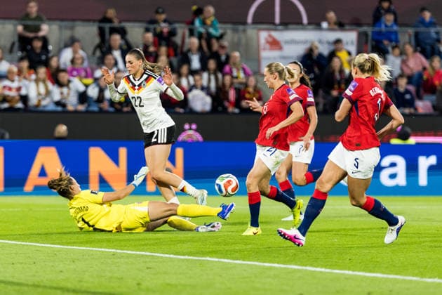 COLOGNE, GERMANY - JUNE 06: Cecilie Fiskerstrand (Norway, 1) stops Jule Brand (Germany, 22) during the UEFA European Qualifiers match for the FIFA Women™s World Cup 2027 between Germany vs. Norway at RheinEnergieSTADION on June 05, 2026 in Cologne, Germany. North Rhine Westphalia Germany Copyright: xSteffiexWunderlx