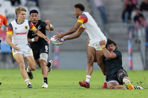 New Zealand Germany, SVNS Rugby World Championship Makonnen Amekuedi Germany, 60 is held by Rob Rush New Zealand but is able to pass the ball to Michael Goedeke Germany, 25 In the background Ngarohi McGarvey Black New Zealand Second group match of the German team against the All Blacks Sevens from New Zealand Third tournament of the SVNS World Championship, Sevens Rugby World Cup from June 5 to 7, 2026 in Bordeaux France Day 1, group matches on June 5, 2026 , Bordeaux Region Nouvelle Aquitaine France Stade Atlantique