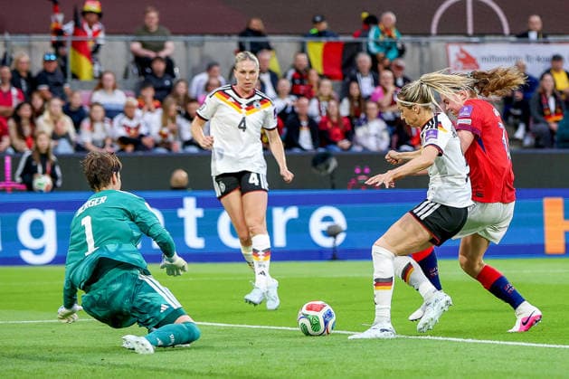 05 06 2026, xsscx, soccer, international match, World Cup qualification women, Germany Norway, Rhein Energie Stadium in Cologne Ann Katrin Berger Germany 1 in duel against Signe Gaupset Norway 22 and Kathrin Hendrich Germany 3 DFB regulations prohibit any use of photographs as image sequences and or quasi video Photo xSandraxScherningxPressefotoKochx Nordrhein Westfalen Germany