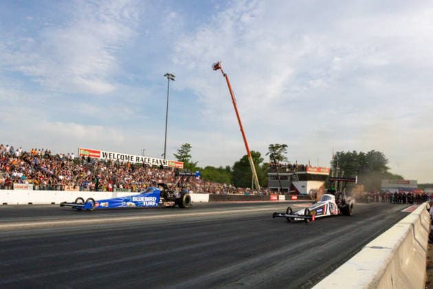 EPPING, NH - JUNE 05: Top Fuel driver, Tony Schumacher ( 15) ACC (near lane) races against Top Fuel driver, Will Smith ( 200) BLUEBIRD TURF RED LINE OIL (far lane) during the Motorsport, Herren, USA, Dragster Drag Race New England Nationals on June 05, 2026, at New England Dragway in Epping, NH. (Photo by David Hahn Icon Sportswire) AUTO: JUN 05 NHRA New England Nationals EDITORIAL USE ONLY Icon260605010