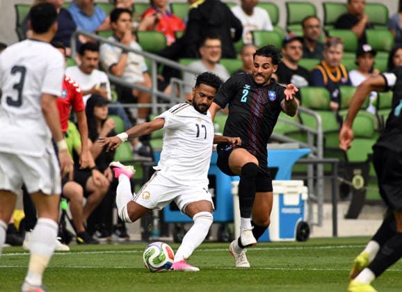 AUSTIN, TX - June 05: Saudi Arabia defender Khalid Alghannam (17) launches a pass as Puerto Rico player Nicolas Cardona (2) defends during International Friendly, Länderspiel, Nationalmannschaft between Saudi Arabia and Puerto Rico on June 5, 2026 at Q2 Stadium in Austin, TX. (Photo by John Rivera Icon Sportswire) SOCCER: JUNE 05 International Friendly Saudi Arabia vs. Puerto Rico EDITORIAL USE ONLY Icon426260605001